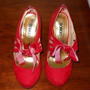 red shoes with bow and cutout